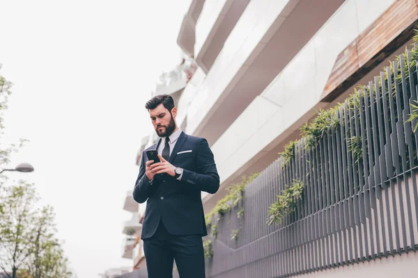 Young Bearded Elegant Businessman Outdoors Using Smartphone Messaging Reading Email — Stock fotografie