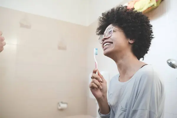 Young Mixed Race Woman Indoor Brushing Teeth — Stock Photo, Image