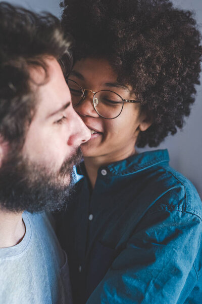 Young Multiethnic Couple Hugging Smiling Together Home Stock Image