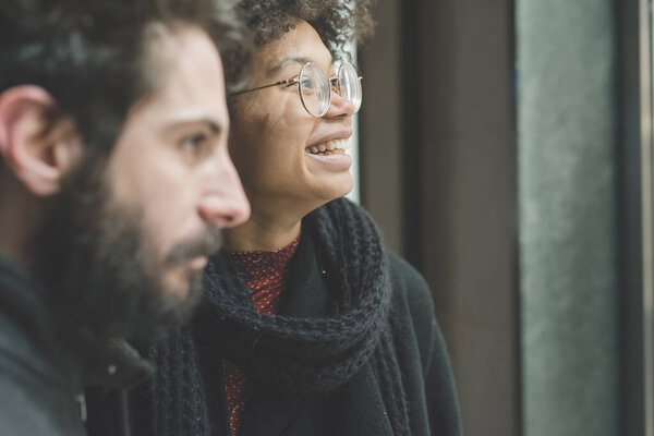 Young Multiethnic Couple Hugging Outdoor Smiling Having Fun Laughing Stock Photo