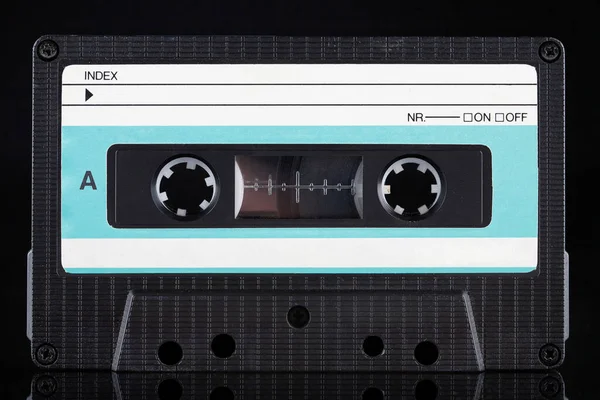 Blue Labeled Retro Vintage Compact Cassette Side Black Background — Stock Photo, Image