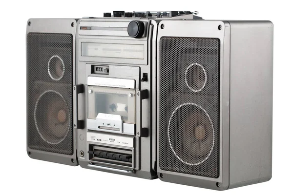 80年代的老式便携式立体声盒式磁带录音机 可反射蓝光和粉红霓虹灯 — 图库照片