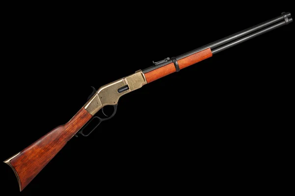 stock image Old west period .44-40 caliber Winchester lever-action repeating rifle on black background