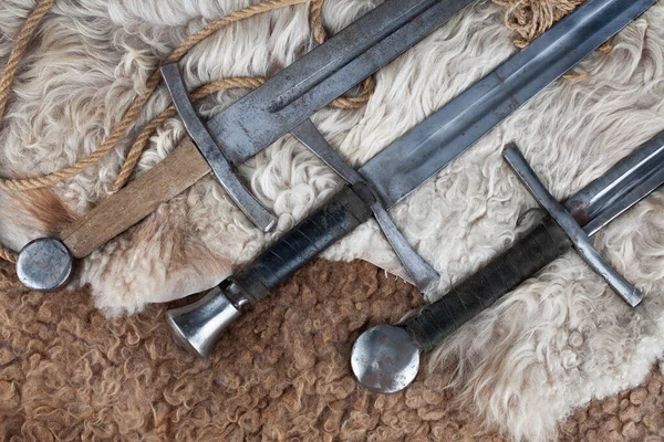 Medieval Swords Sheep Fur Background — Stock Photo, Image