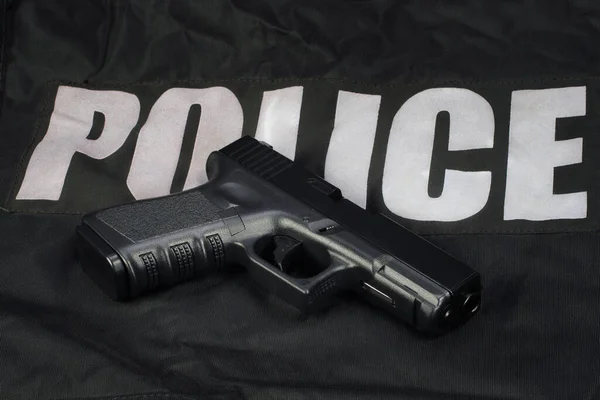 Polícia Mão Arma Preto Uniforme Fundo — Fotografia de Stock