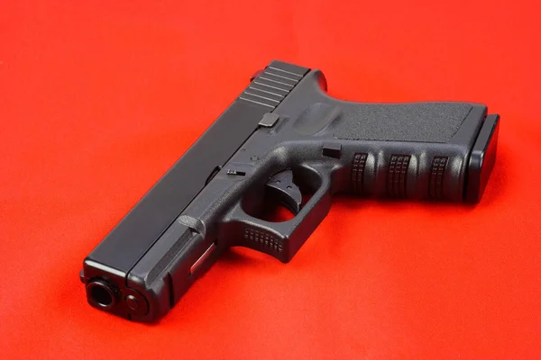 Semiauto Handgun Red Canvas Background — Stock Photo, Image