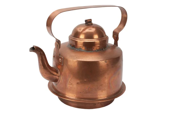 白色背景的古董铜茶壶 图库图片