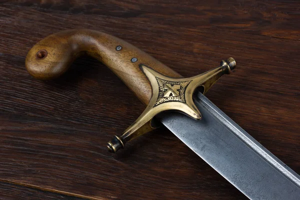 stock image Ukraine Saber Sword on wooden deck, 17th century. Poland, Lithuania, Hungary, Ukraine.