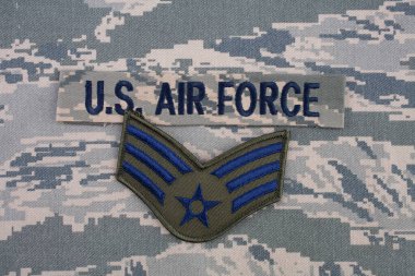 August 31, 2020. US AIR FORCE branch tape and Senior Airman rank patch on digital tiger-stripe pattern Airman Battle Uniform (ABU) background clipart