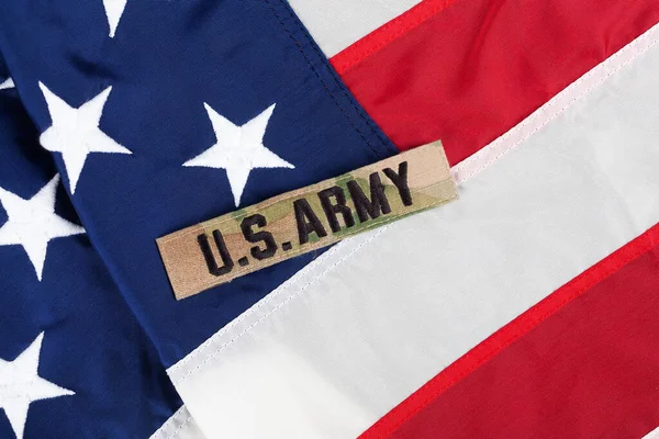 stock image US ARMY Branch Tape on national USA flag background