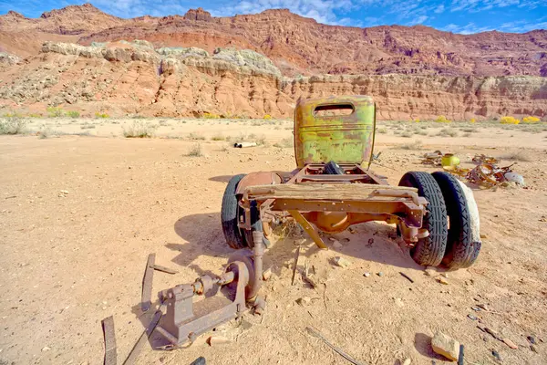 A rusting antique truck on the far west side of Lonely Dell Ranch near Vermilion Cliffs National Monument Arizona. Located in the Glen Canyon Recreation Area along the Paria River. Open to the public.