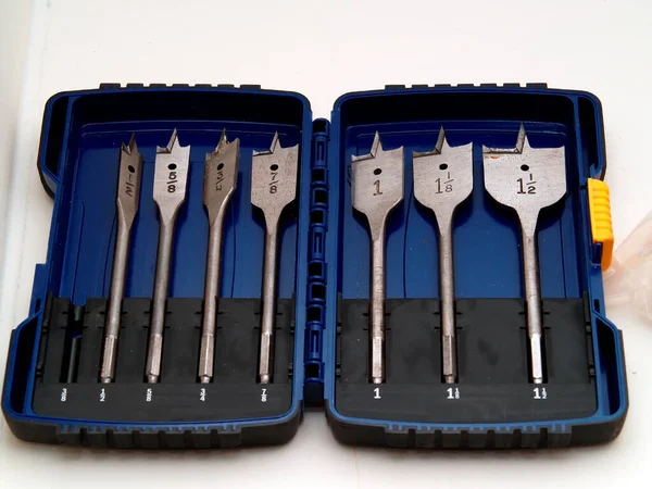 stock image A tool pack of spade drill bits for wood drilling. This pack is one bit short in its collection.