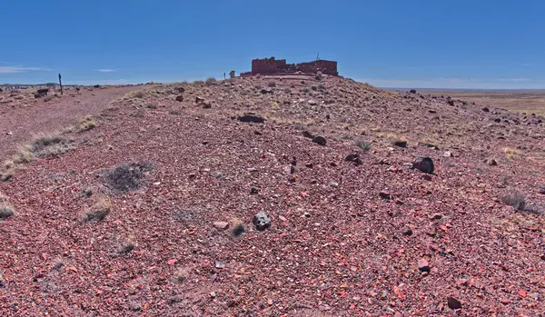The historic Agate House on a hill in Petrified Forest National Park Arizona.