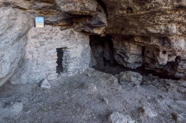 Ancient Indian cliff dwellings at Montezuma Well National Monument Arizona known as the Swallet Ruins. clipart