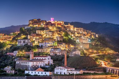 Corigliano Calabro, Italy hilltop townscape at blue hour. clipart