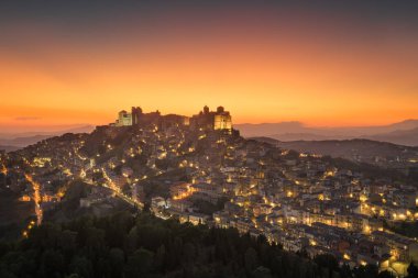 Troina, Sicily, Italy hilltop townscape at dusk. clipart