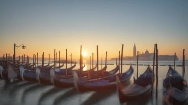 Gondolas on the Grand Canal of Venice, Italy in the early morning.