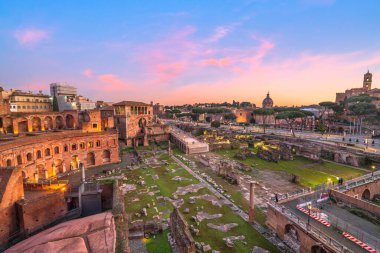 Rome, Italy overlooking Trajan's Forum at dusk.