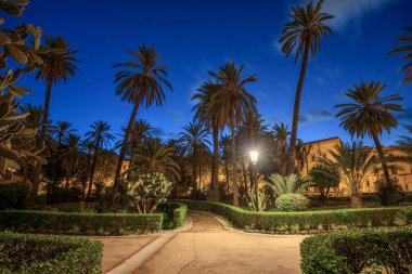 Palermo, Italy at Villa Bonnano public gardens at blue hour.