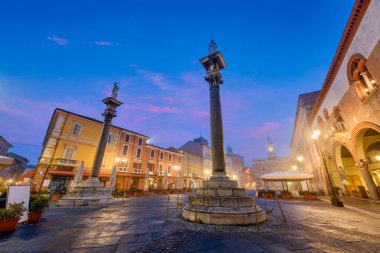 Ravenna, Italy at Piazza del Popolo with the landmark Venetian columns at dusk.