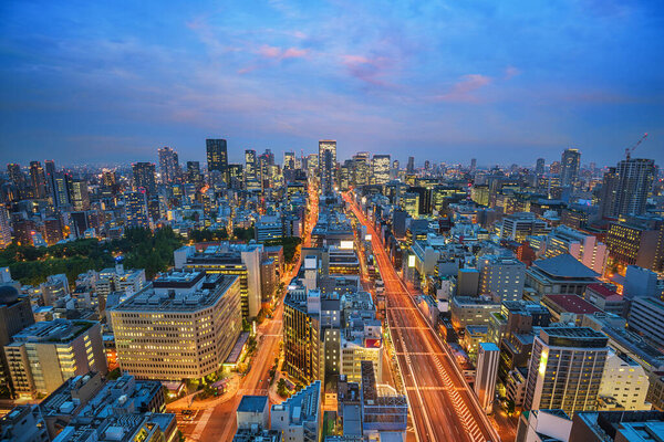 Osaka, Japan cityscape at twilight.