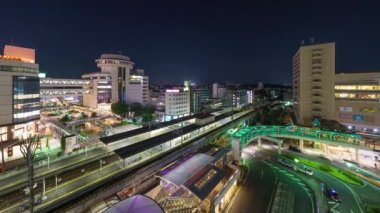 Toyotashi, Aichi, Japonya alacakaranlıkta ana istasyon üzerinde ufuk çizgisi.