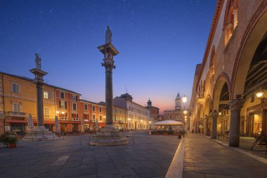 Ravenna, Italy at Piazza del Popolo with the landmark Venetian columns at twilight. clipart