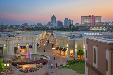 Shreveport, Louisiana, USA downtown city skyline and shopping areas at dusk. clipart