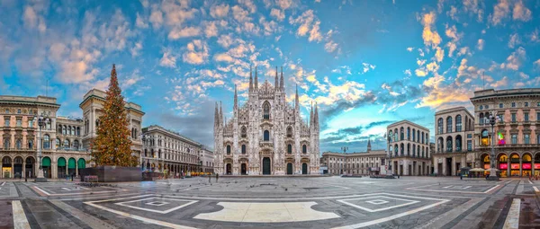 Milan, Italy at the Milan Duomo and Galleria during Christmas time at dawn.