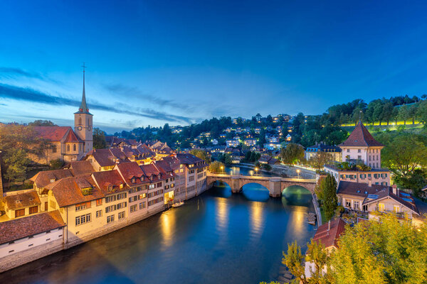Bern, Switzerland on the Aare River at night.