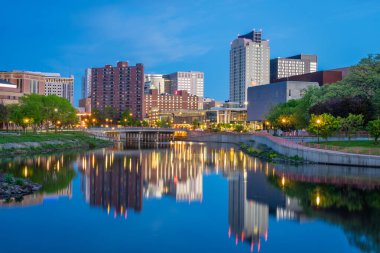 Rochester, Minnesota, USA cityscape on the Zumbro River at blue hour. clipart