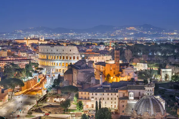 stock image Rome, Italy over the Roman Forum at blue hour.