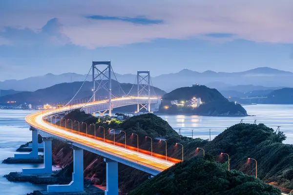 stock image Onaruto Bridge connecting  Awaji Island to Tokushima, Japan at twilight.