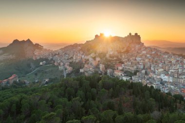 Troina, Sicily, Italy hilltop townscape at sunset. clipart