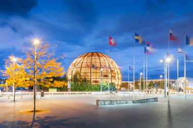 GENEVA, SWITZERLAND - OCTOBER 3, 2023: Cern Visitor Center at blue hour. The research center operates the largest particle physics laboratory in the world. clipart