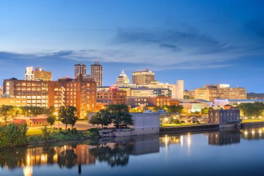 Peoria, Illinois, USA downtown skyline on the lake at dusk. clipart