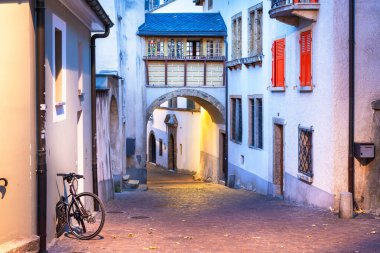 Sion, Switzerland old town streets at twilight. clipart