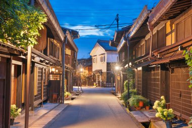 Takayama, Japan at the historic Sannomachi Street in the old town at twilight. clipart