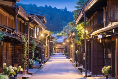 Takayama, Japan at the historic Sannomachi Street in the old town at twilight. clipart