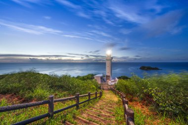 Hirakubozaki Lighthouse on Ishigaki Island, Okinawa, Japan. clipart