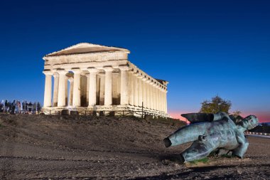 AGRIGENTO, ITALY - OCTOBER 31, 2022: Temple of Concordia in at night. clipart