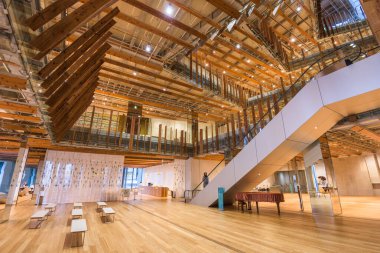 TOYAMA, JAPAN - JANUARY 30, 2017: Inside the Toyama City Public Library. The building opened in 2015. clipart