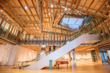 TOYAMA, JAPAN - JANUARY 30, 2017: Inside the Toyama City Public Library. The building opened in 2015. clipart