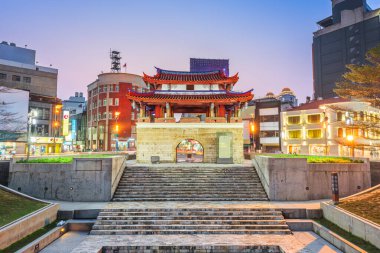 Hsinchu, Taiwan downtown cityscape with the Eastern Gate. clipart