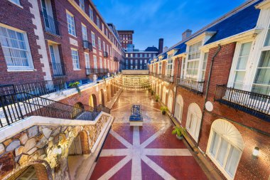 Omaha, Nebraska, USA historic downtown alleyways at blue hour. clipart