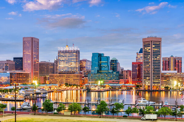 Baltimore, Maryland, USA Skyline on the Inner Harbor at dusk.