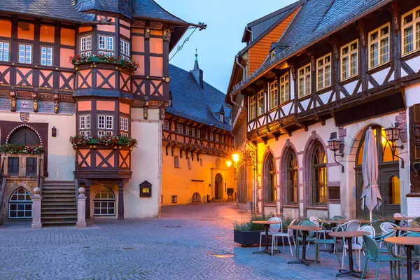 Medieval street with half-timbered houses in Wernigerode at night, Saxony-Anhalt, Germany