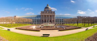 The Bavarian State Chancellery in Munich, Germany, set against a clear blue sky. clipart