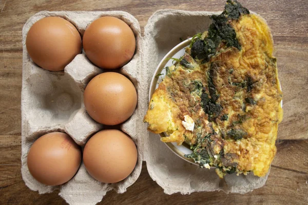 stock image rustic homemade omelette clove with spinach