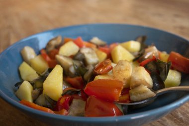fried peppers and potatoes for a sicilian peperonata